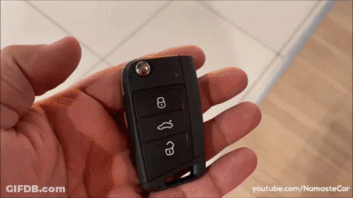 Person Holding Car Key With YouTube NamasteCar GIF