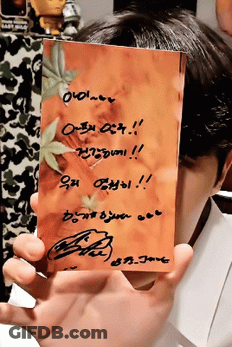 Person Holding Card Saying I Love You GIF