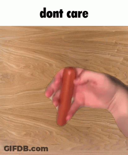 Person Holding Carrot Saying Dont Care GIF