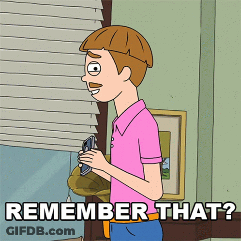 Person Holding Cat In Front Of J + J Wall GIF