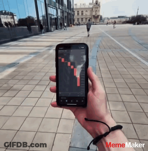 Person Holding Cell Phone With Graph Mememaker Logo GIF