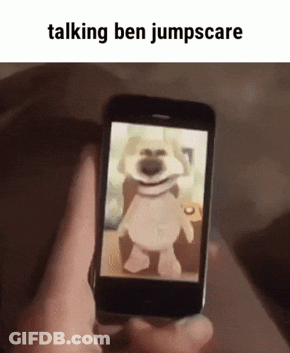 Person Holding Cell Phone With Teddy Bear GIF