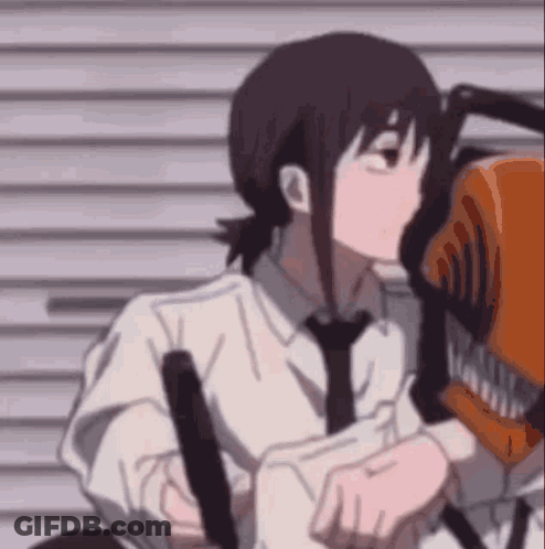 Person Holding Chainsaw Close Up GIF