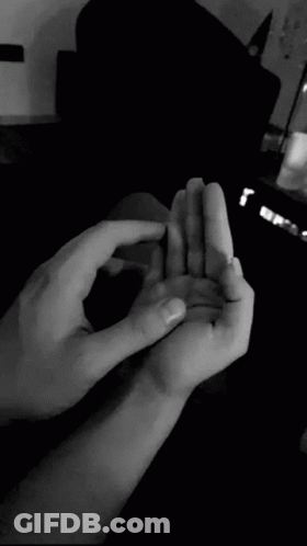 Person Holding Child's Hand Black And White GIF