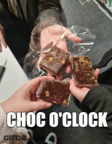 Person Holding Chocolate Saying Choc O'Clock GIF