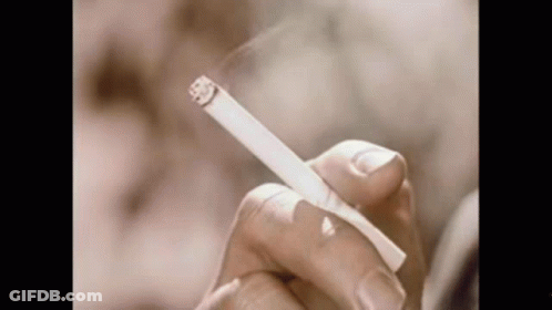 Person Holding Cigarette GIF