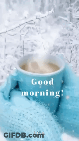 Person Holding Coffee In Snow GIF