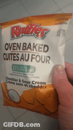 Person Holding Cookie With Insider Written On Bottom GIF