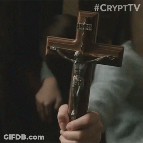 Person Holding Cross With Jesus GIF
