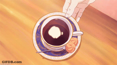 Person Holding Cup Of Coffee On Saucer GIF