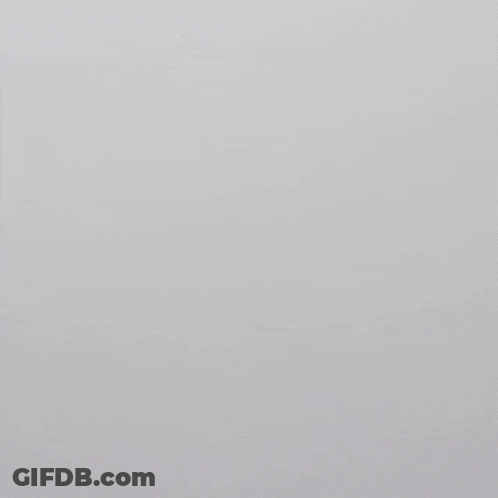 Person Holding Cup Of Coffee With White Handle GIF