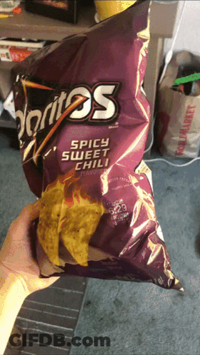 Person Holding Doritos Spicy Sweet Chili GIF