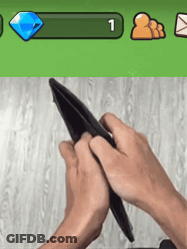 Person Holding Empty Wallet In Front Of Green Bar Number 1 GIF