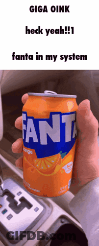Person Holding Fanta Orange Soda GIF