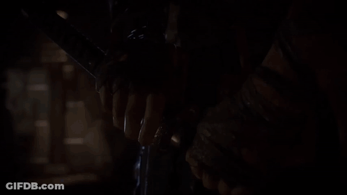 Person Holding Flashlight In Dark Room GIF