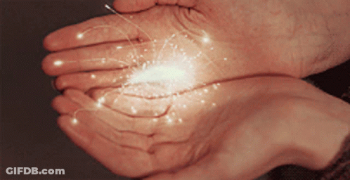 Person Holding Glowing Sparkler GIF