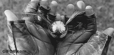 Person Holding Golden Snitch Black And White GIF