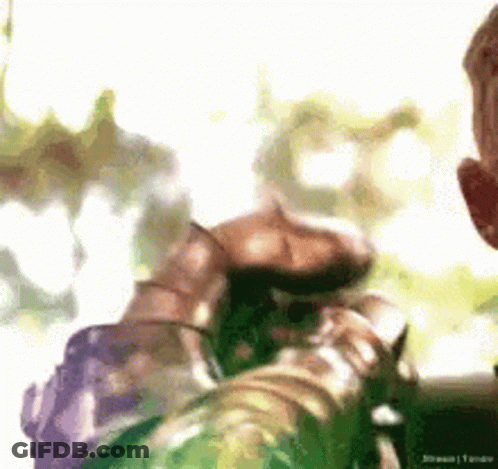 Person Holding Green Object GIF