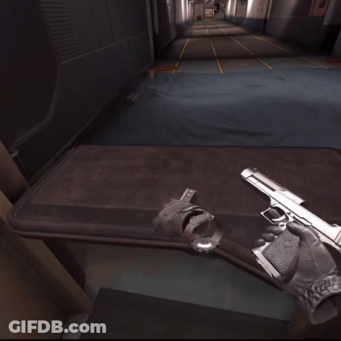 Person Holding Gun At Shooting Range GIF