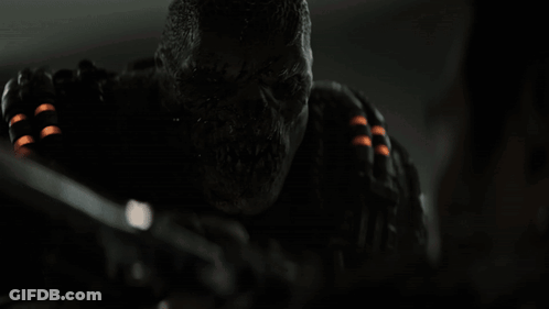 Person Holding Gun Close Up GIF
