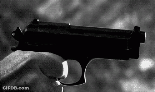 Person Holding Gun GIF
