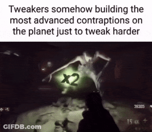 Person Holding Gun In Dark Room With Green X2 GIF