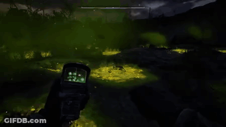 Person Holding Gun In Field GIF