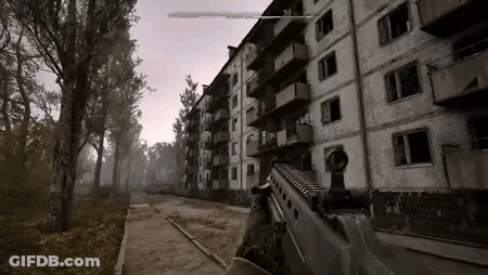 Person Holding Gun In Front Of Abandoned Building GIF