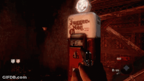 Person Holding Gun In Front Of Juggler Nog Box GIF