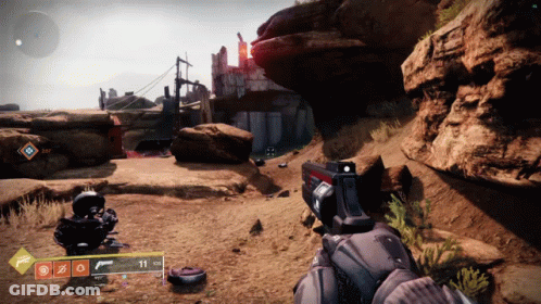 Person Holding Gun With Number 11 GIF
