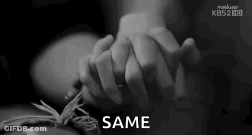 Person Holding Hands With Same Text GIF