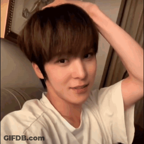 Person Holding Head GIF