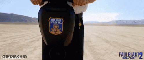 Person Holding Helmet Saying West Orange Police Hall GIF