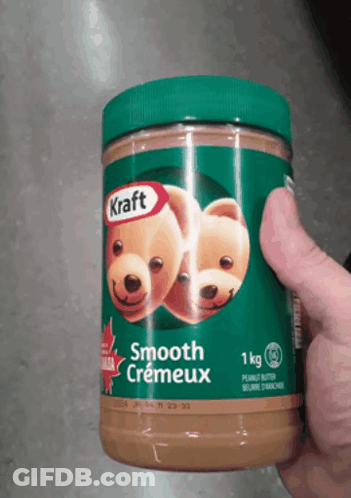 Person Holding Jar Of Smooth Creameux Peanut Butter GIF