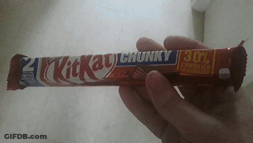 Person Holding KitKat Chunky Candy Bar GIF