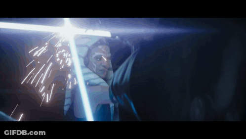 Person Holding Light Saber GIF