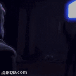 Person Holding Light Saber GIF