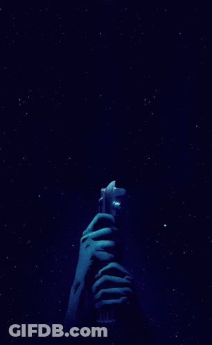 Person Holding Light Saber GIF