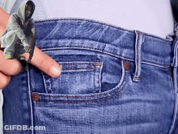Person Holding Man In Hoodie Picture In Pocket GIF