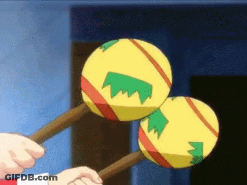 Person Holding Maracas GIF