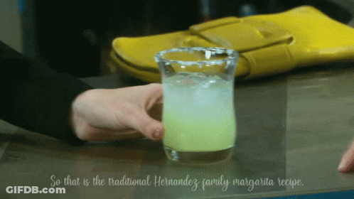 Person Holding Margarita GIF