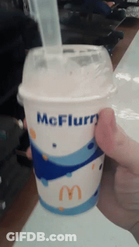 Person Holding McFlurry Cup GIF