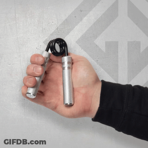 Person Holding Metal Hand Gripper With Black Spring GIF