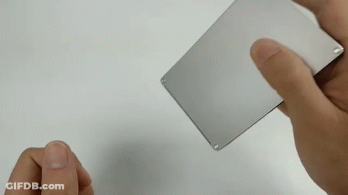 Person Holding Metal Phone GIF