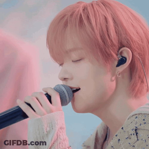 Person Holding Microphone In Mouth GIF