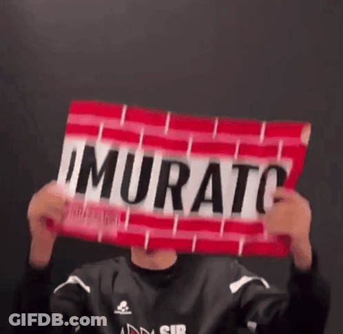 Person Holding Murato Sign GIF