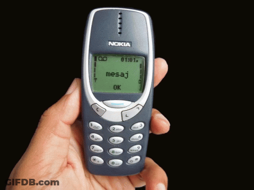 Person Holding Nokia Cell Phone With Message GIF