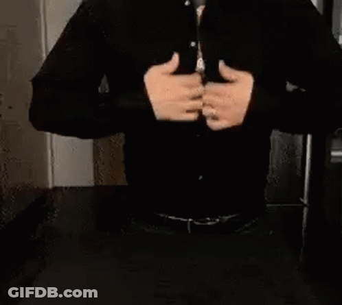 Person Holding Old Fashioned Sign GIF