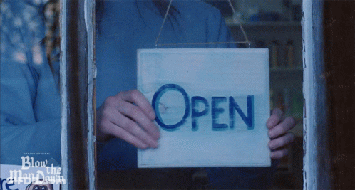 Person Holding Open Sign GIF