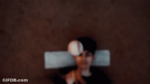 Person Holding Paper Lantern On Head GIF